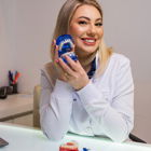 Dra. Karinne Siqueira (Cirurgiã-Dentista)