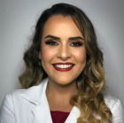 Dra. Renata Brasil Cardoso Miniguelo (Cirurgiã-Dentista)